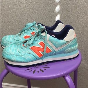 Turquoise w/ orange logo New Balance 574